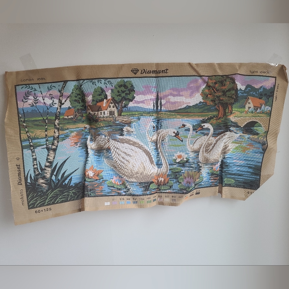 vintage unfinished needlepoint canvas featuring a swan design